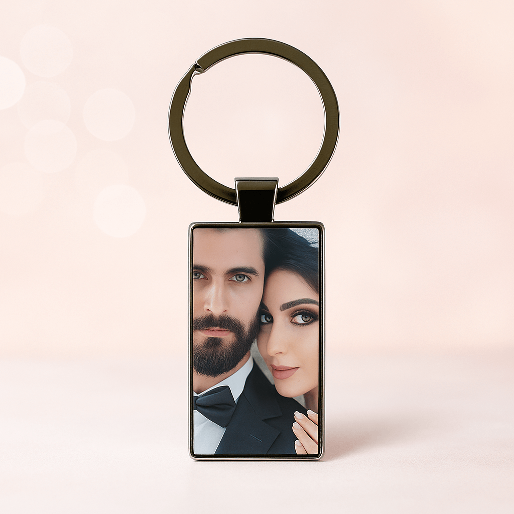 Custom keychain featuring a close-up of an elegant bride and groom in formal attire, capturing an intimate wedding moment. Made by Your iDeas Shop.
