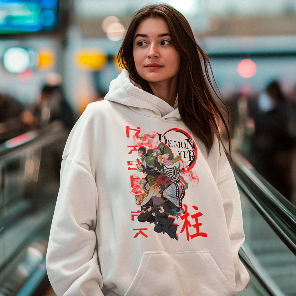 A vibrant white hoodie with a detailed and action-packed design inspired by the popular anime "Demon Slayer", featuring main characters in dynamic poses with Japanese text and red flame elements. A must-have for anime fans. Made by Your iDeas Shop.