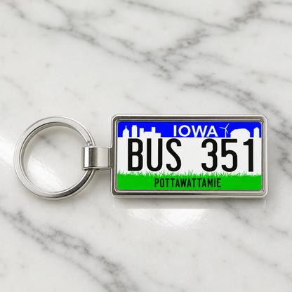 Iowa BUS 351 license plate keychain on_marble