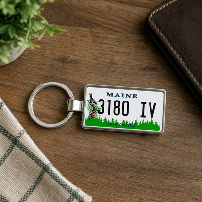 Maine 3180 IV license plate keychain on_wood