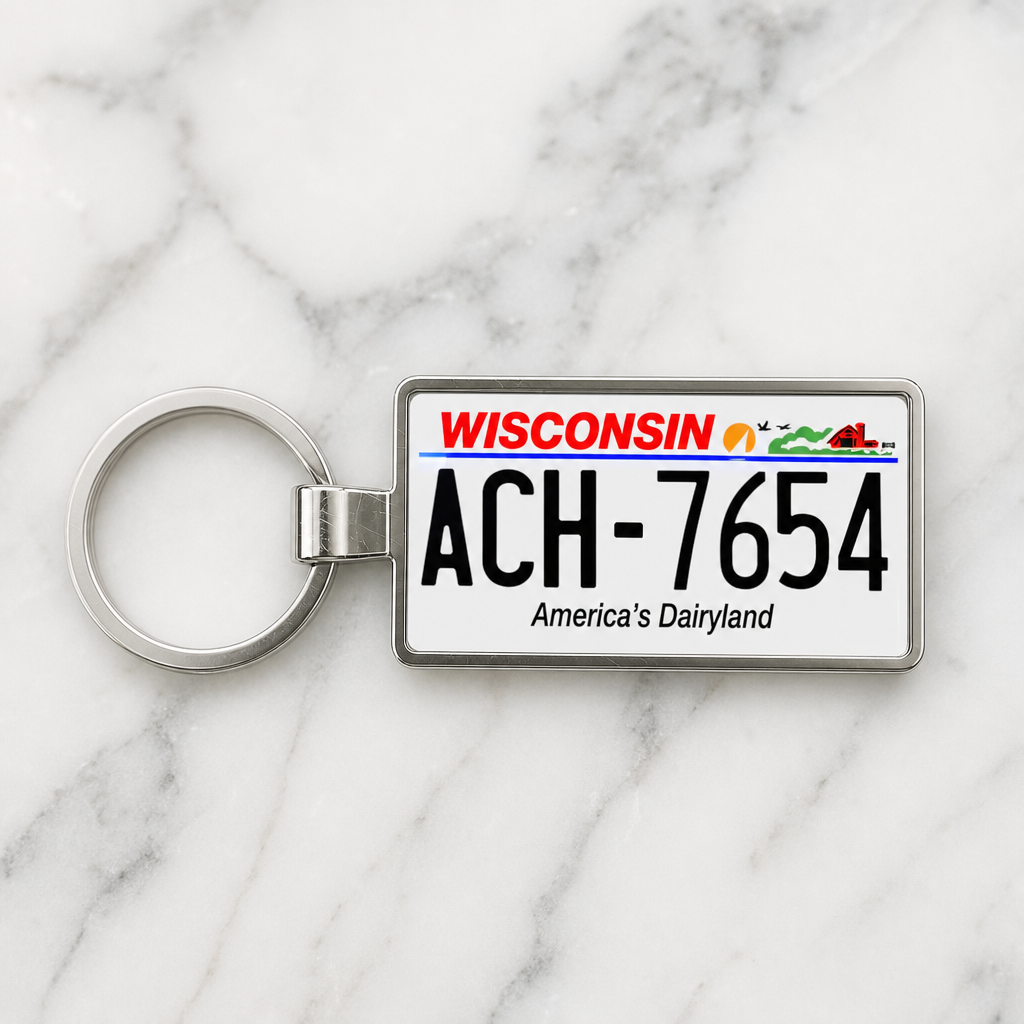 Wisconsin license plate keychain on marble