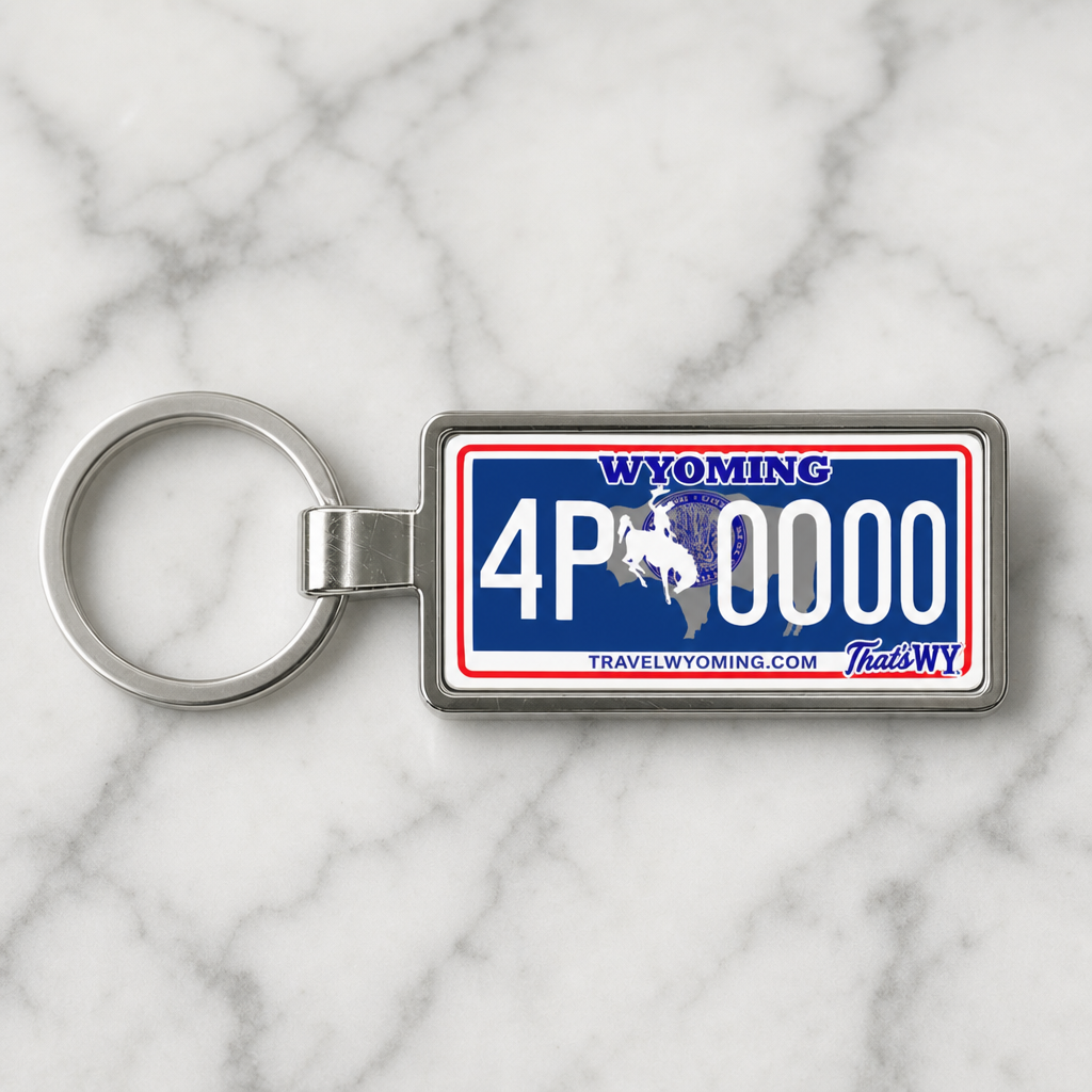 Wyoming license plate keychain on marble