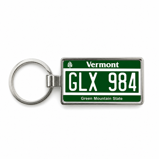 Vermont GLX 984 license plate keychain on white background