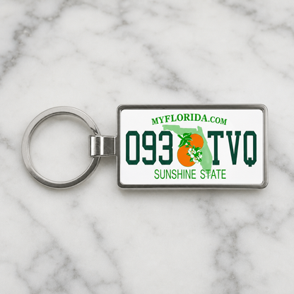Florida 093 TVO license plate keychain on_marble