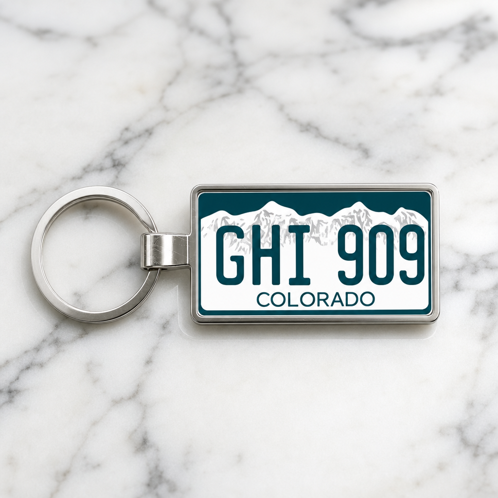 Colorado GHI 909 license plate keychain on_marble