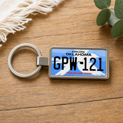 Oklahoma GPW 121 license plate keychain on_wood