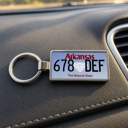Arkansas 678 DEF license plate keychain on_dashboard