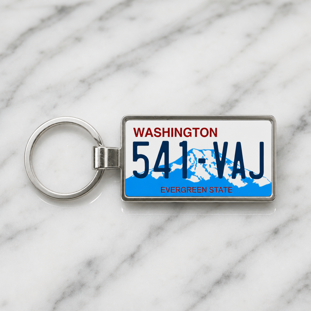 Washington license plate keychain on marble
