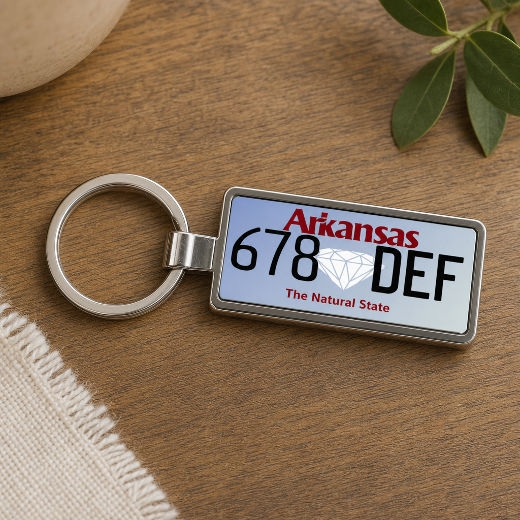 Arkansas 678 DEF license plate keychain on_wood