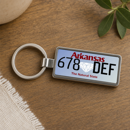 Arkansas 678 DEF license plate keychain on_wood