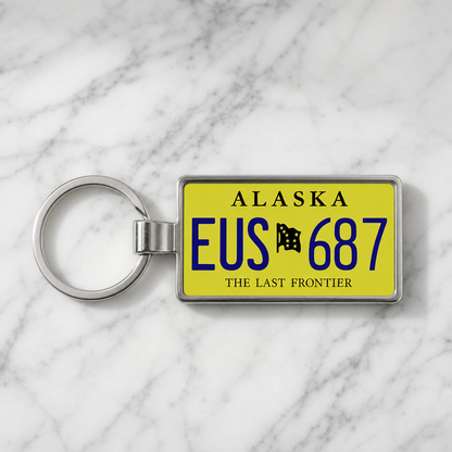 Alaska EUS 687 license plate keychain on_marble