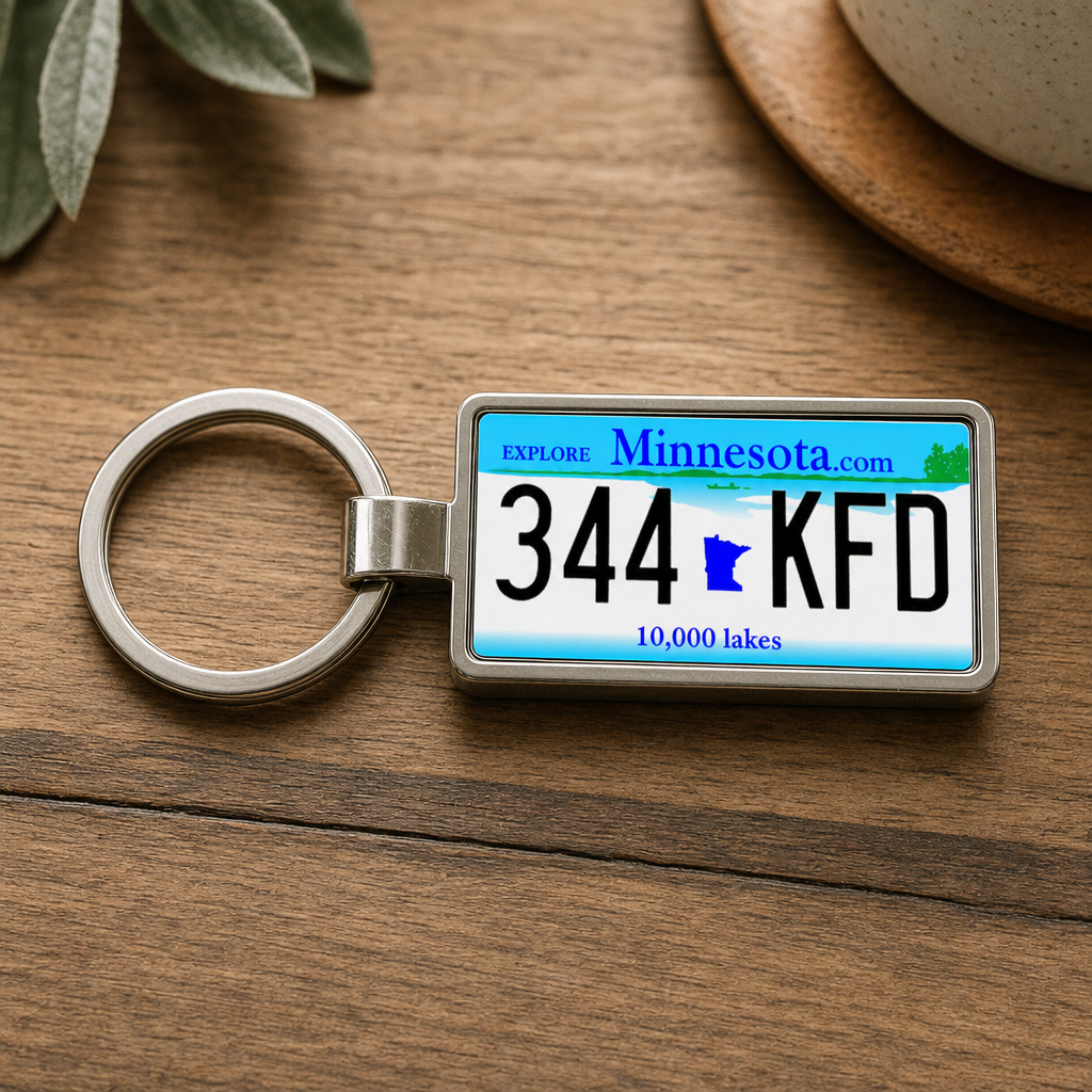 Minnesota 344 KFD license plate keychain on_wood