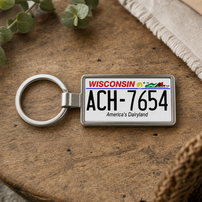 Wisconsin license plate keychain on wooden table