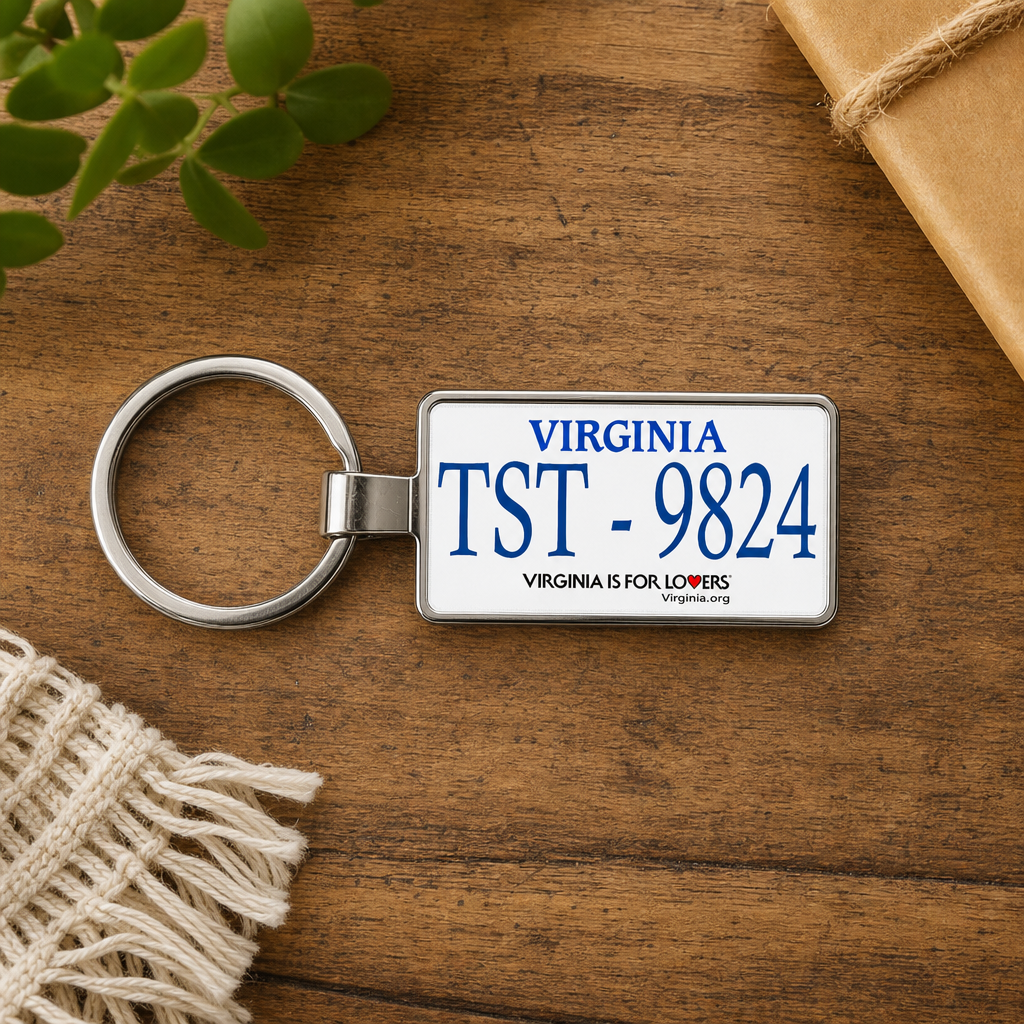 Virginia license plate keychain on wooden table