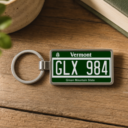 Vermont license plate keychain on wood