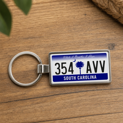 South Carolina 354 AVV license plate keychain on_wood