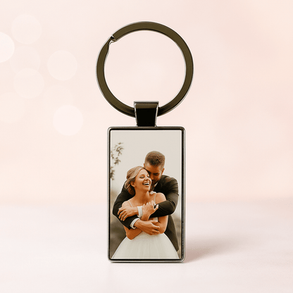 Personalized keychain with a joyful bride and groom embracing on their wedding day, perfect keepsake for newlyweds or anniversary gifts. Made by Your iDeas Shop.