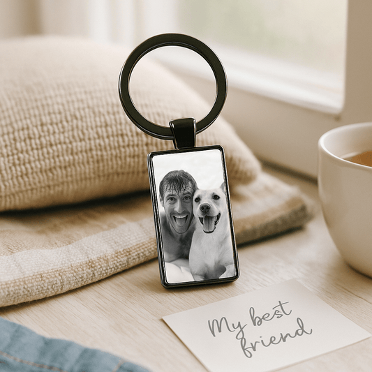 Custom keychain with black-and-white photo of a man and his dog sticking out their tongues, perfect for pet lovers celebrating their best friend. Made by Your iDeas Shop.