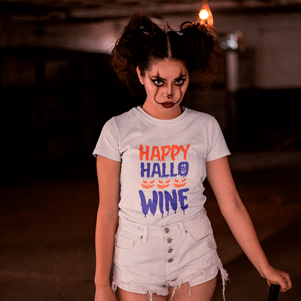 Person wearing a 'Happy HalloWINE' shirt in a dark setting