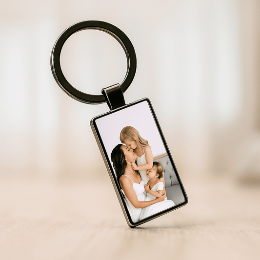 Personalized keychain with a mother and her two daughters sharing a tender moment, ideal keepsake for Mother's Day or family celebrations. Made by Your iDeas Shop.