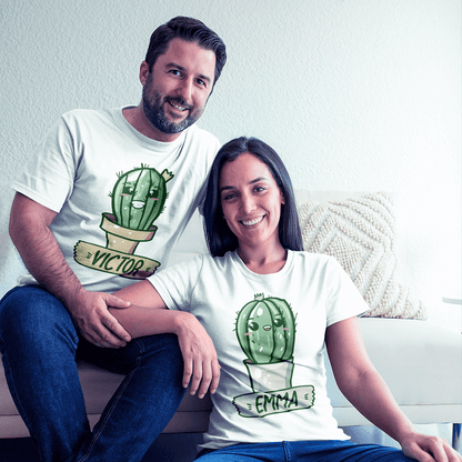 Man and woman sitting on a couch wearing white t-shirts with cactus designs and names.