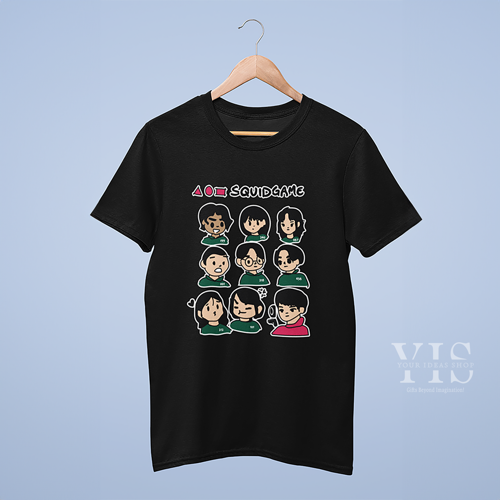 A sleek black T-shirt displaying cartoon depictions of Squid Game characters. The artwork includes detailed character faces in a neatly arranged grid, with the series' iconic shapes and title above. Perfect for showcasing fandom in a casual yet trendy style. Made by Your iDeas Shop