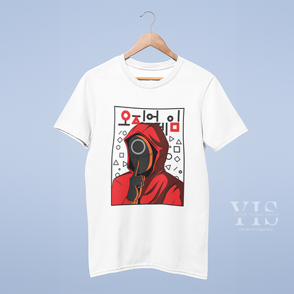 A mockup of a white T-shirt hanging on a wooden hanger, featuring a red-hooded Squid Game character with a circle mask, surrounded by geometric shapes and Korean text. Displayed against a light blue background. Made by Your iDeas Shop