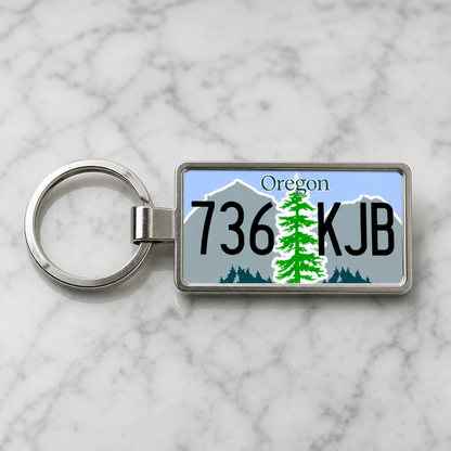 Oregon 736 KJB license plate keychain on_marble