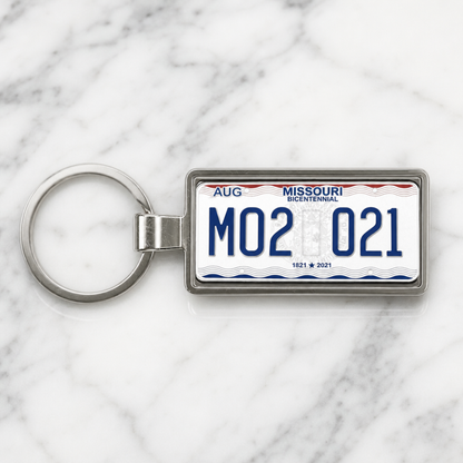 Missouri M02 021 license plate keychain on_marble