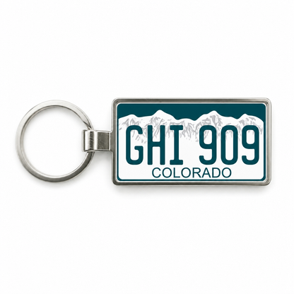 Colorado GHI 909 license plate keychain white_bg