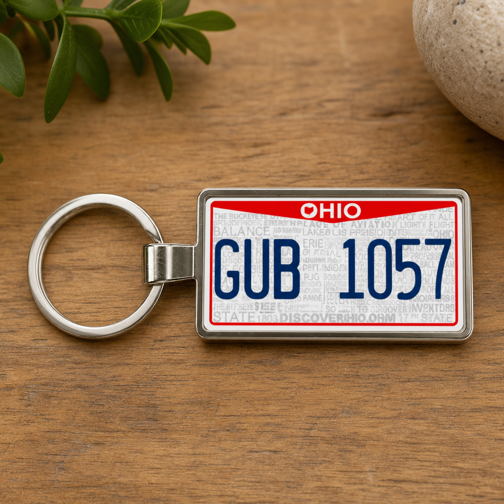 Ohio GUB 1057 license plate keychain on_wood