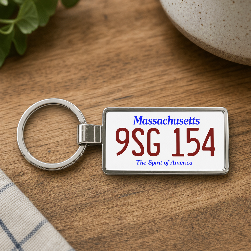 Massachusetts 9SG 154 license plate keychain on_wood