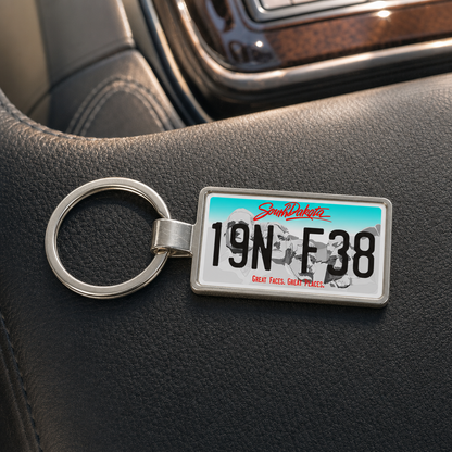 South Dakota license plate keychain on dashboard
