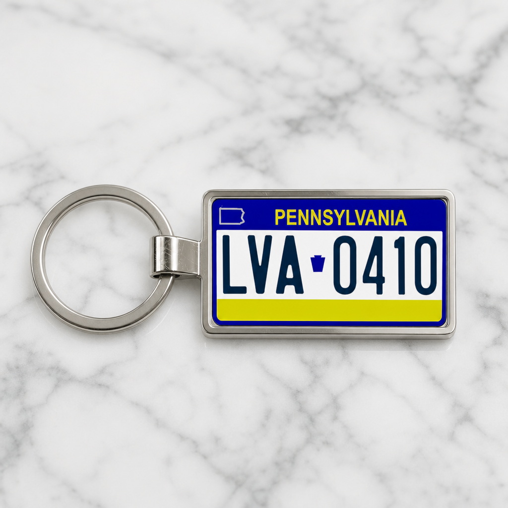 Pennsylvania LVA 0410 license plate keychain on_marble