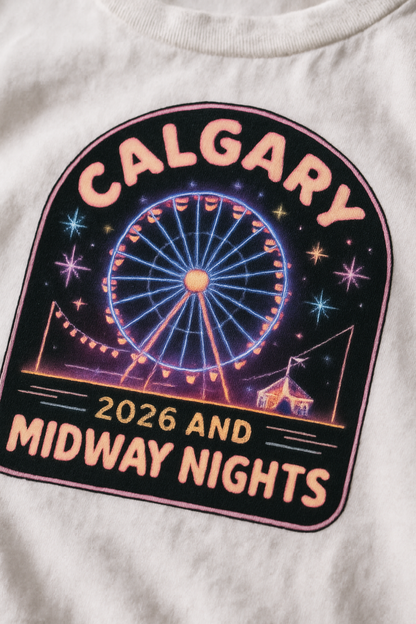 Calgary Nights 2026 print close-up — neon Ferris wheel badge on white cotton, CALGARY 2026 MIDWAY NIGHTS
