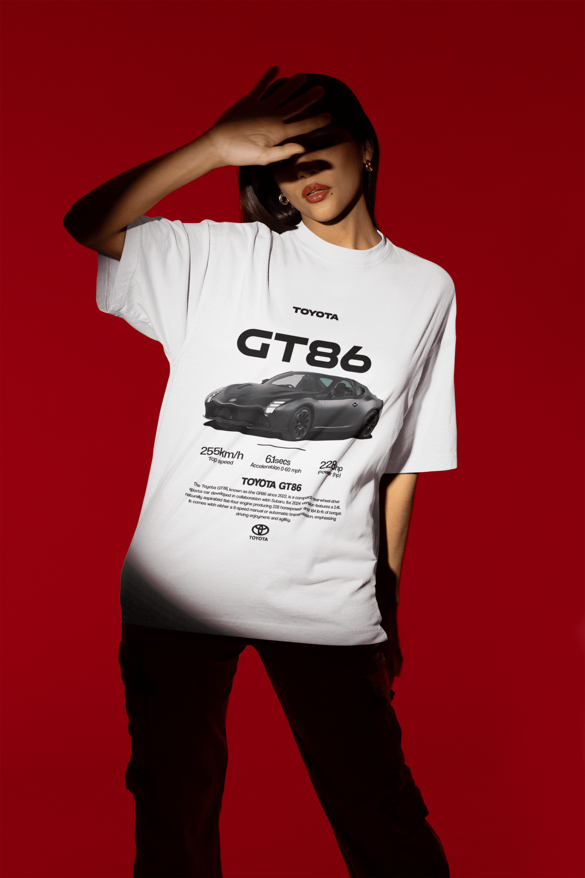 Back view of a person wearing a black Toyota GT86 Sports Car Graphic T-Shirt featuring specs and sleek car design.