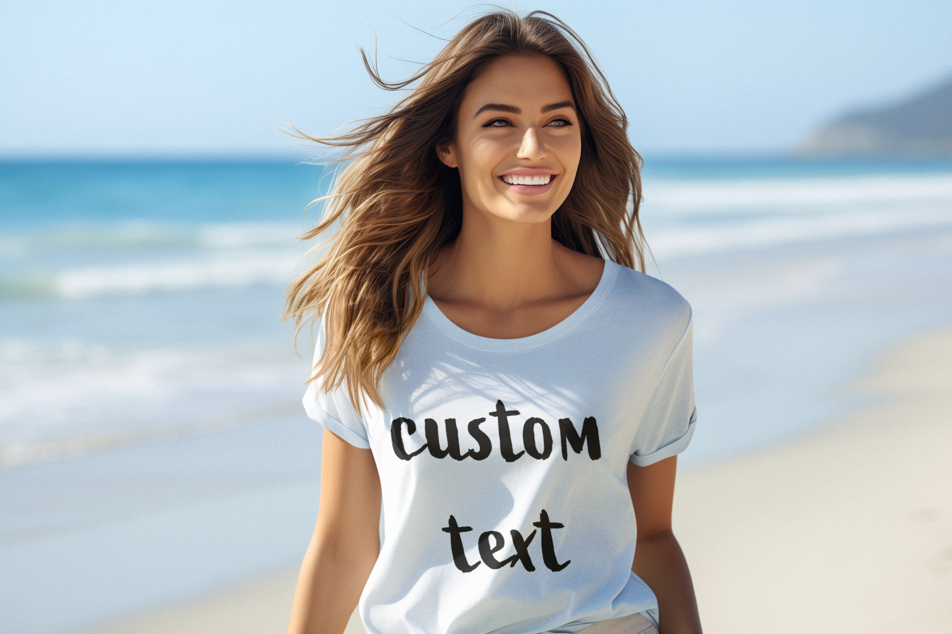 Smiling woman wearing a custom t-shirt with personalized text while standing on a beach