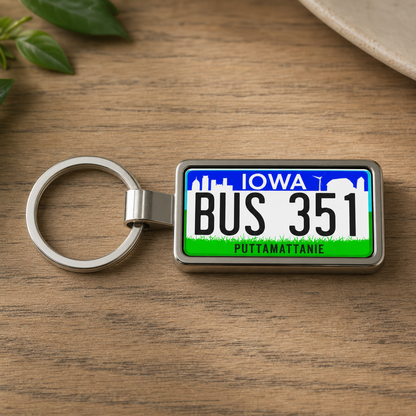 Iowa BUS 351 license plate keychain on_wood