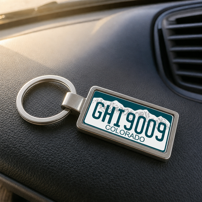 Colorado GHI 909 license plate keychain on_dashboard