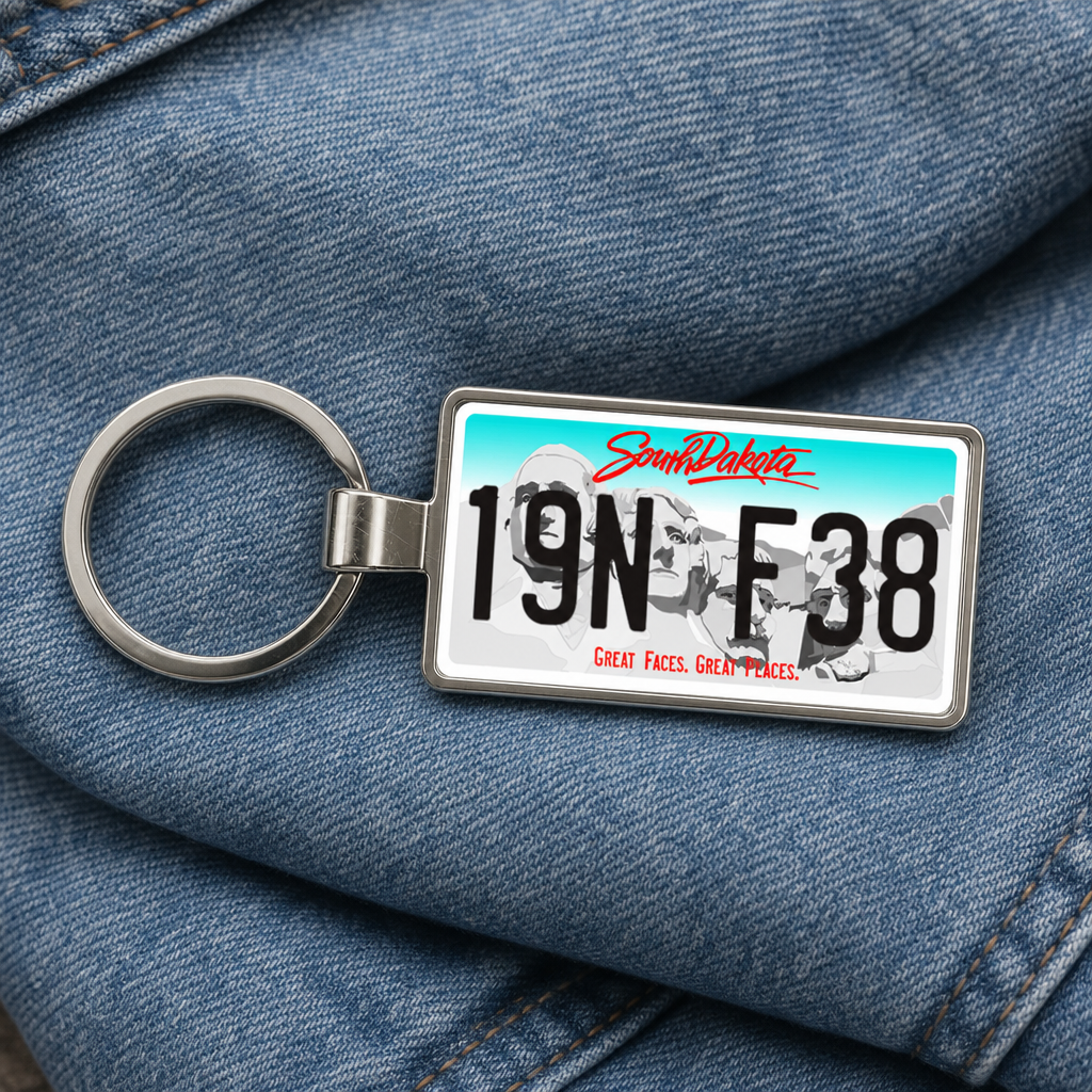 South Dakota license plate keychain on denim