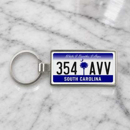 South Carolina 354 AVV license plate keychain on_marble