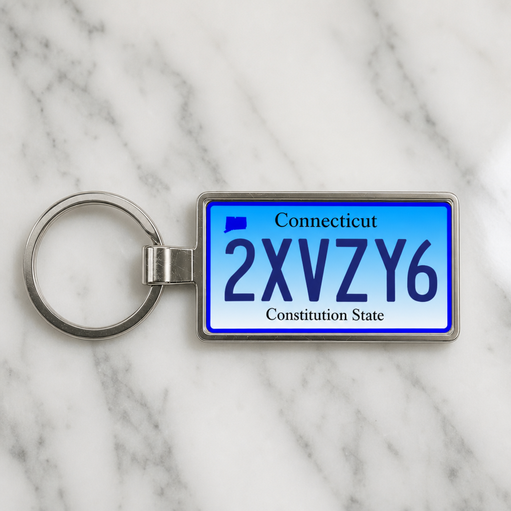 Connecticut 2XVZY6 license plate keychain on_marble