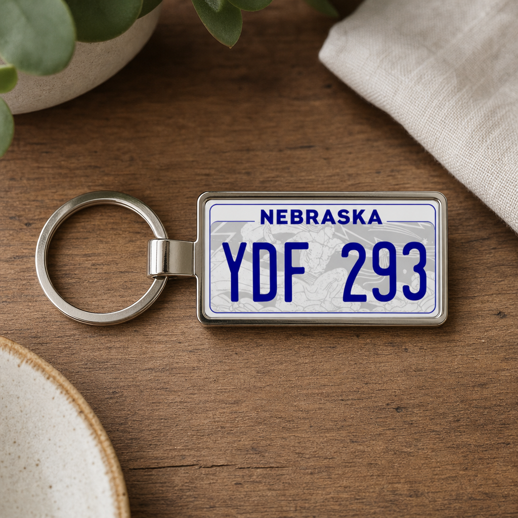 Nebraska YDF 293 license plate keychain on_wood