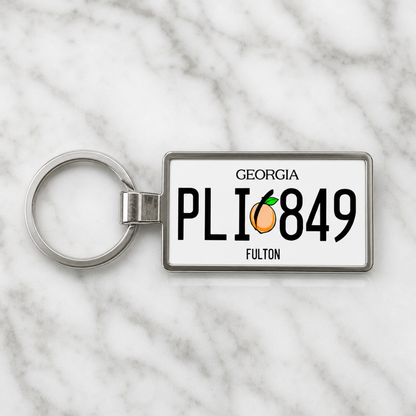 Georgia PLI 8349 license plate keychain on_marble