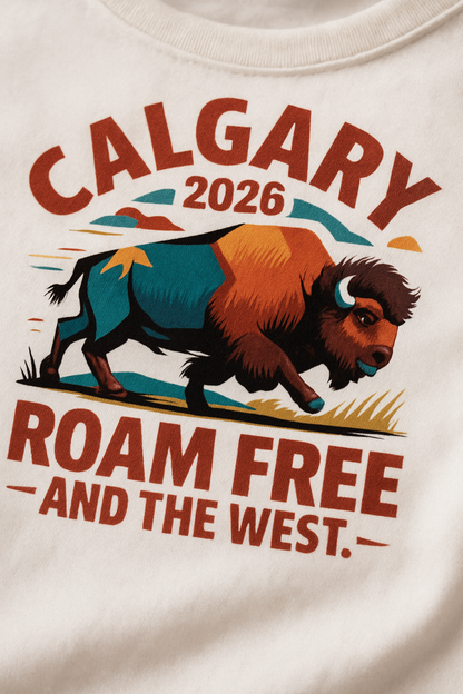 Roam Free Calgary 2026 print close-up — geometric color-block bison on white cotton, CALGARY 2026 ROAM FREE THE WEST