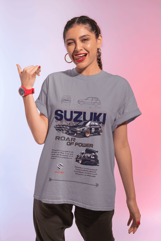 Suzuki Swift Graphic tee in gray worn by a smiling model showcasing the design with 'Roar of Power' slogan.